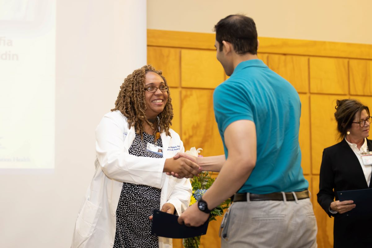 Student accepting an award at the 2023 Honors and Awards Ceremony